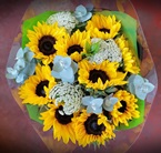 Deliver a mixture of bright coloured choice cut flowers arranged in a woven basket - Click to enlarge